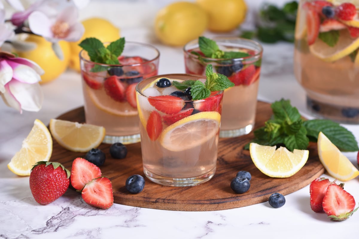Lemonade with strawberries, blueberries and mint
